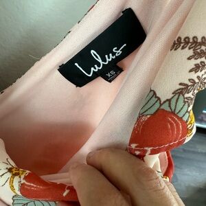 Lulus orange midi dress with cute ruffles on the sleeve in XS size